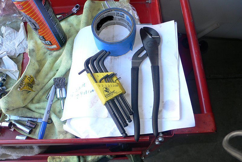 Pliers and Blue Tape